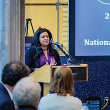 Samantha Maragh speaks on stage after receiving the State of Maryland Outstanding Young Scientist Award 2019.