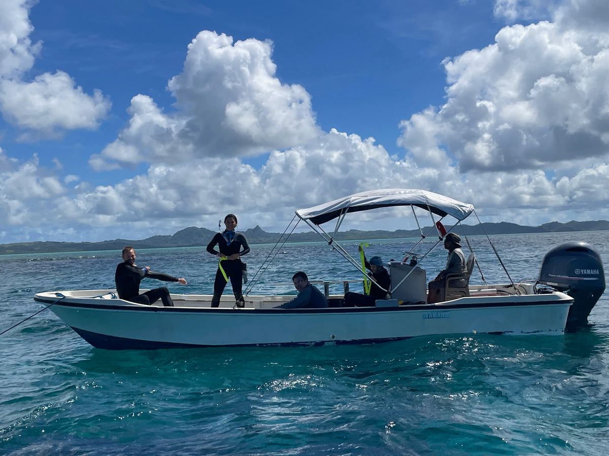 Image of study coauthors Thomas Koch and Ho Yan Yeung (two leftmost figures) on a boat.