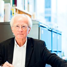 Lasker Award winner Piet Borst sits at his desk.