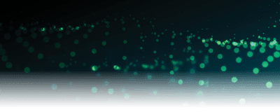 An array of green dots, some faded, some bright, on a black background.