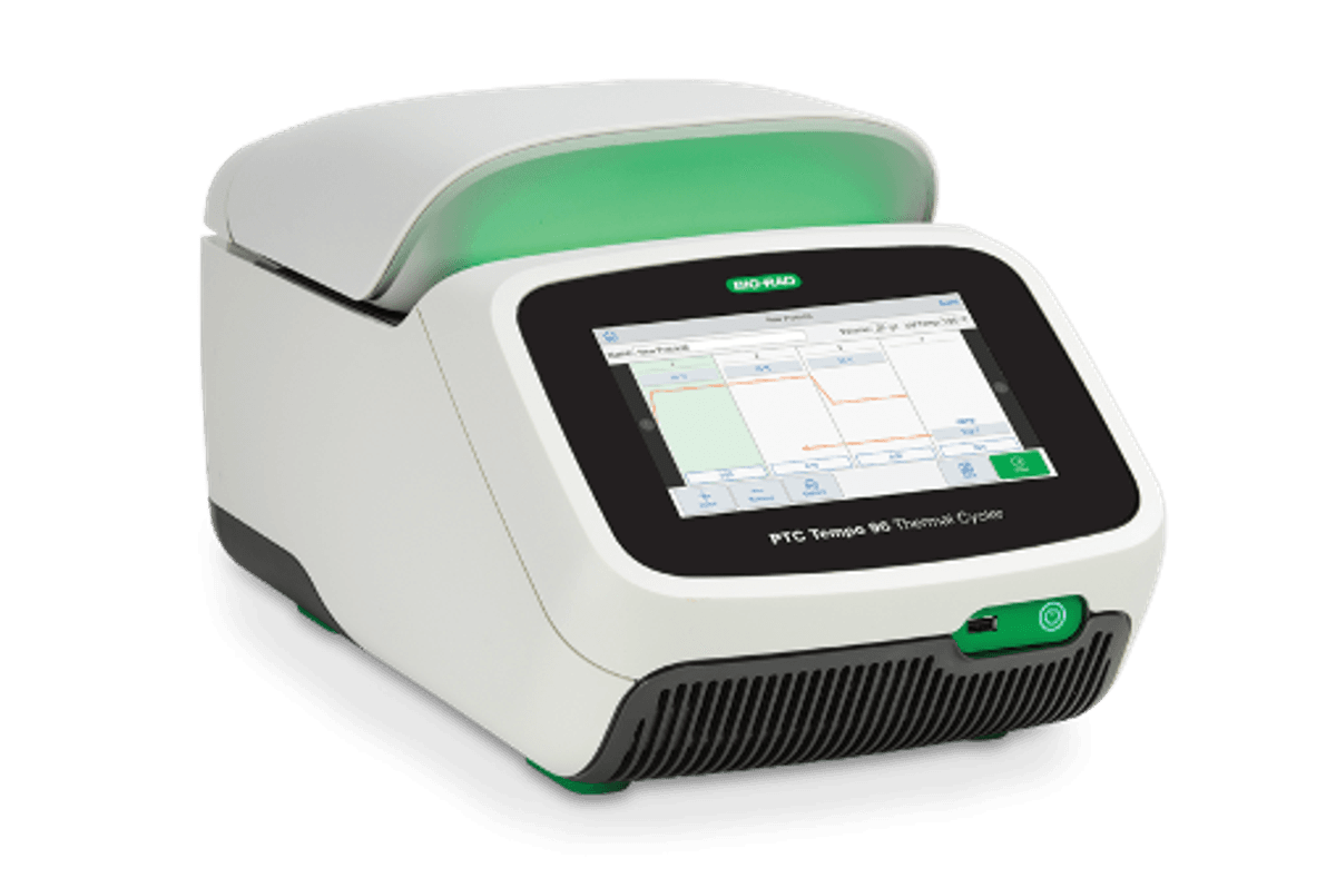 Image of a laboratory PCR instrument in white, green, and black.