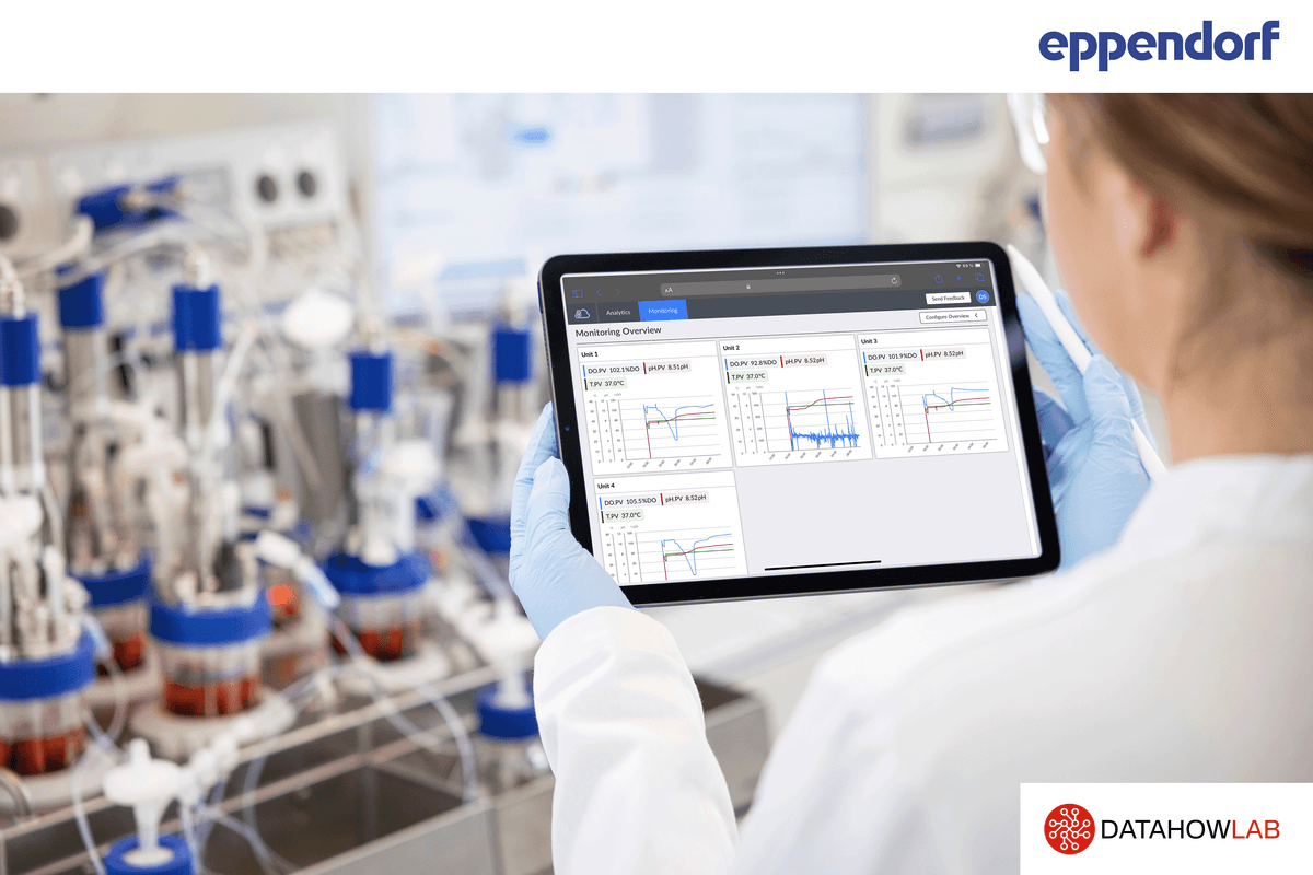 Scientist holding electronic tablet up in a lab.